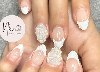 Exquisite shell-themed nails at Nails By Nks, Phnom Penh, Phnom Penh, KH. Perfect manicure artistry.