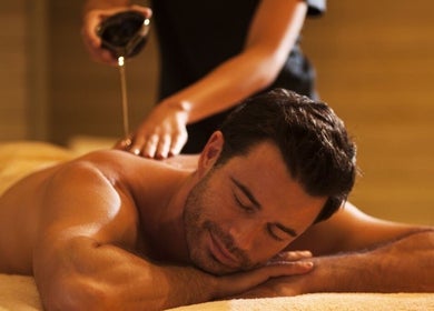 Massage therapy at ZOLA B2B WITH HAPPYENDING SPA in Bengaluru, Karnataka, IN offers ultimate relaxation.