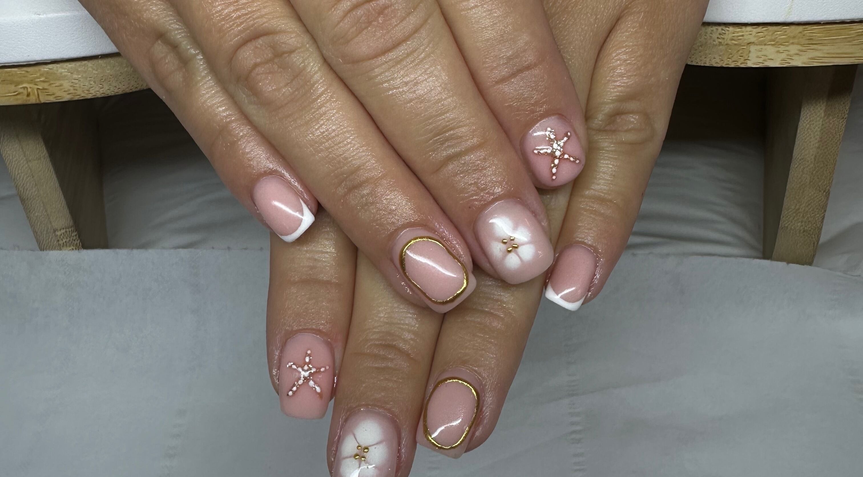 Stylish nail art with rhinestones at Primrose Beauty, Langford, England, GB.