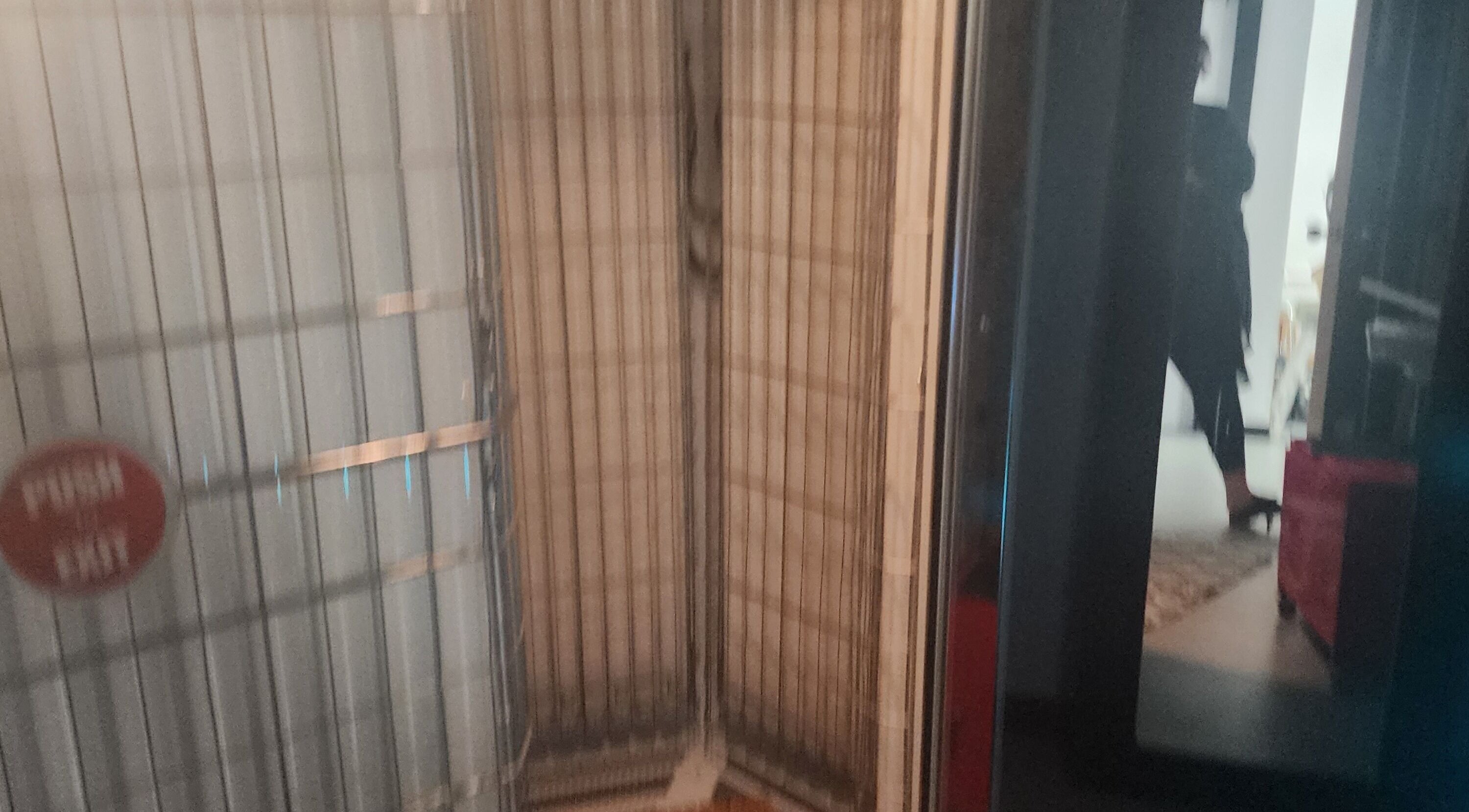 Entrance of Divine Salon and Spa in Langdon, Alberta, CA, showcasing a warm, welcoming interior.