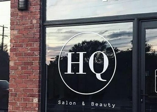 HQ Salon and Beauty Aspendale, Victoria, AU storefront with logo and contact details on window.