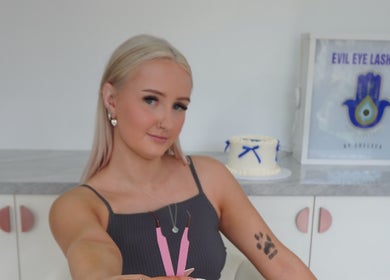 Expert lash technician at Evil Eye Lash Bar, Melbourne, Victoria, AU, showcasing precision tools.