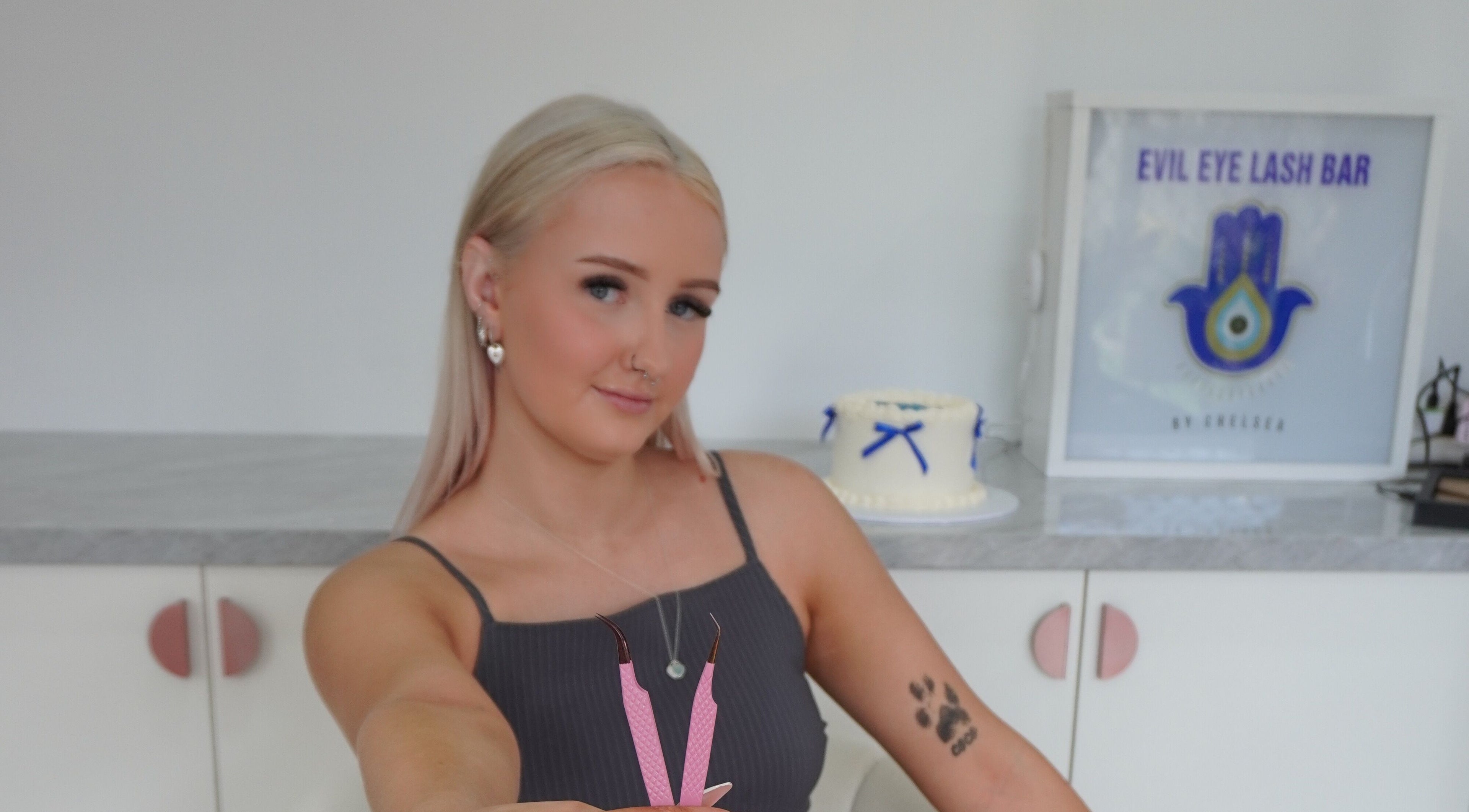 Expert lash technician at Evil Eye Lash Bar, Melbourne, Victoria, AU, showcasing precision tools.