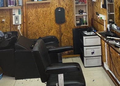 Modern barber chair set up at Aididthebarber in Klang, Selangor, MY, featuring sleek design and grooming tools.