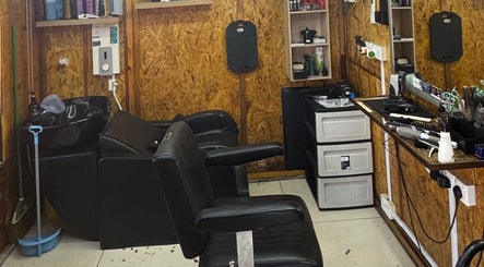 Modern barber chair set up at Aididthebarber in Klang, Selangor, MY, featuring sleek design and grooming tools.