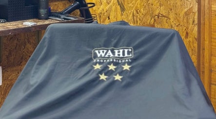 Aididthebarber in Klang, Selangor, MY showcases a professional barber chair covered with a Wahl cover.