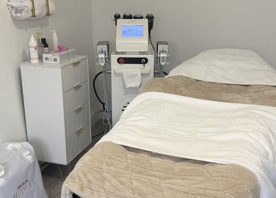 Cozy treatment room at Sculpted By Hayley in Winchester, England, GB with modern equipment and soothing ambiance.