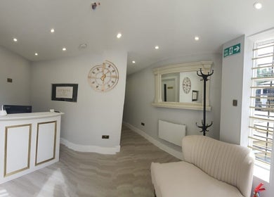 Welcoming reception area in Citrine Clinic, Ilford, England, GB, featuring elegant decor and comfortable seating.