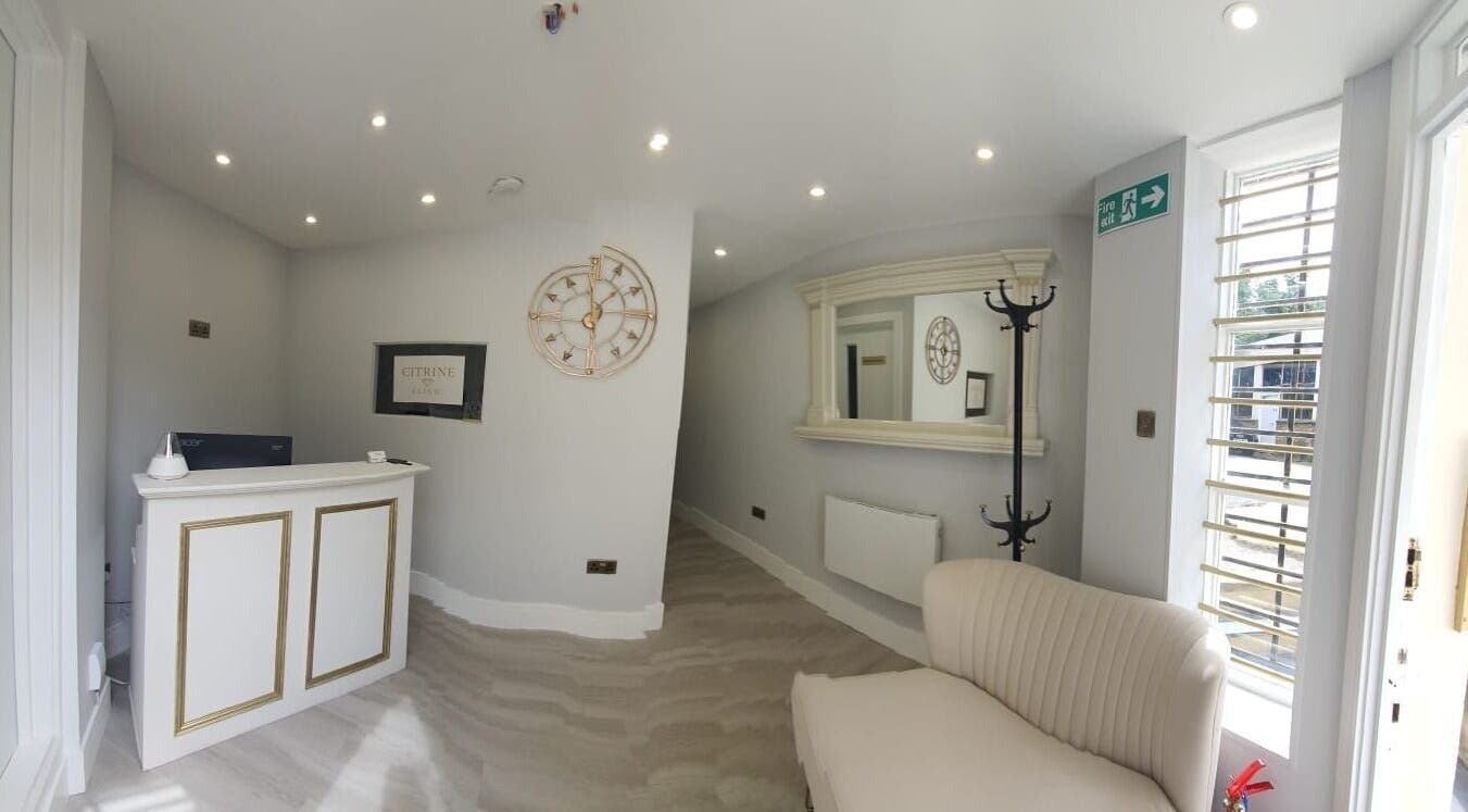 Welcoming reception area in Citrine Clinic, Ilford, England, GB, featuring elegant decor and comfortable seating.