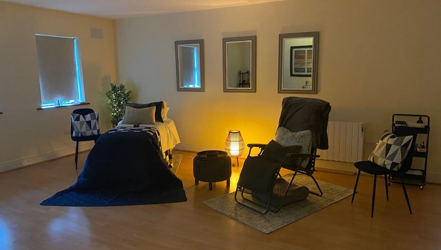 Tranquil therapy room at Celestial Blessings Therapy, Newport, County Tipperary, IE, with cozy lighting.