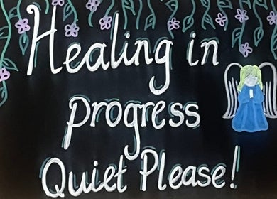 Decorative sign reading 'Healing in Progress' at Celestial Blessings Therapy, Newport, County Tipperary, IE.