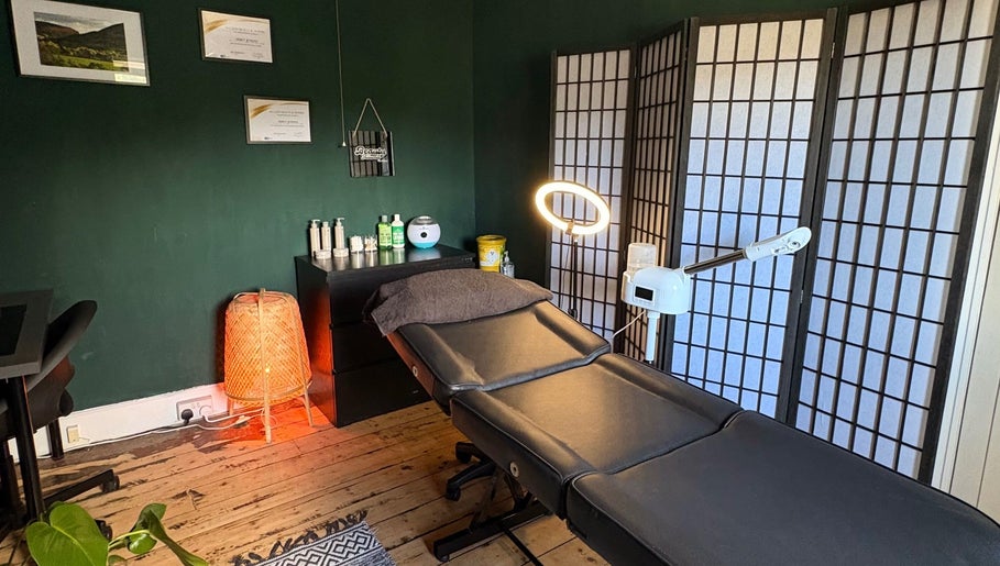 Relaxing therapy room at Beauty Rituals by Abbey, Abergavenny, Wales, GB with massage bed and warm lighting.