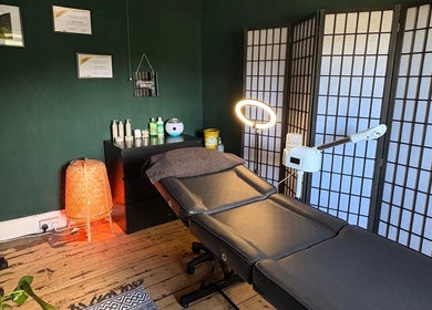 Relaxing therapy room at Beauty Rituals by Abbey, Abergavenny, Wales, GB with massage bed and warm lighting.