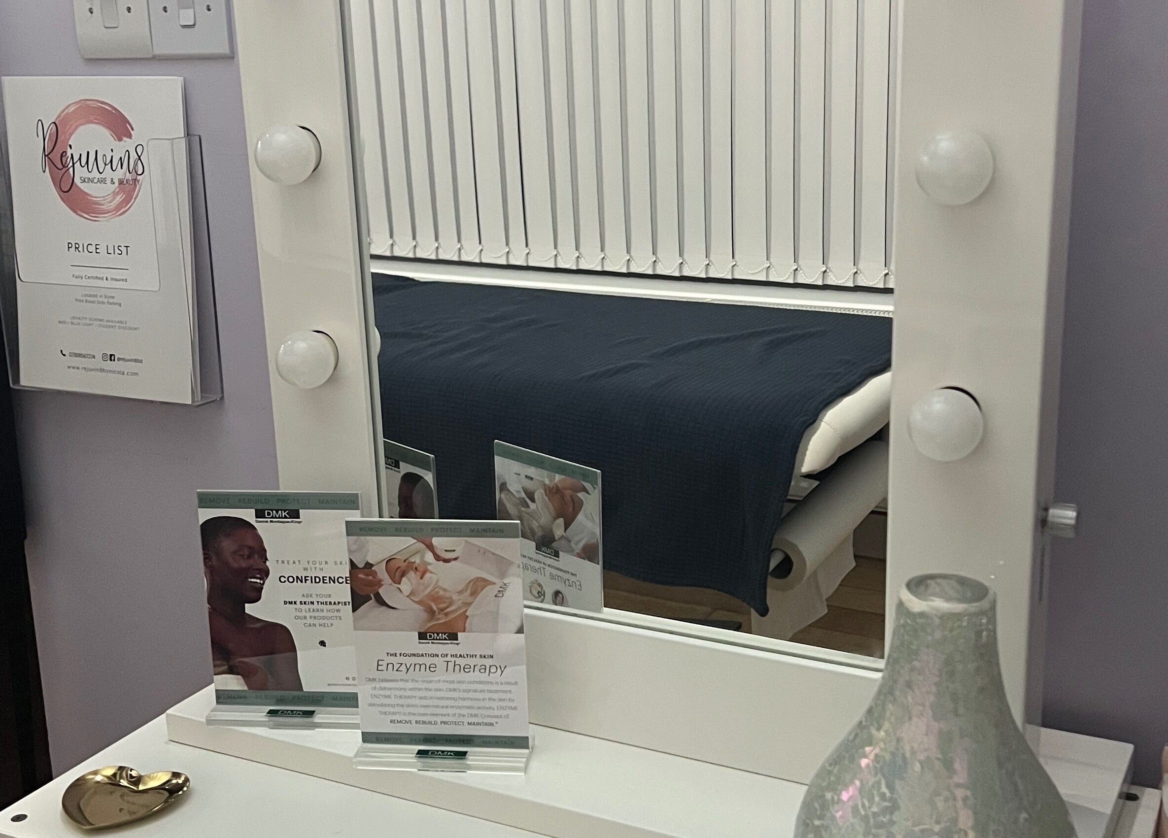 Rejuvin8 beauty station with mirror, price list, and therapy brochures in Slyne, England, GB.