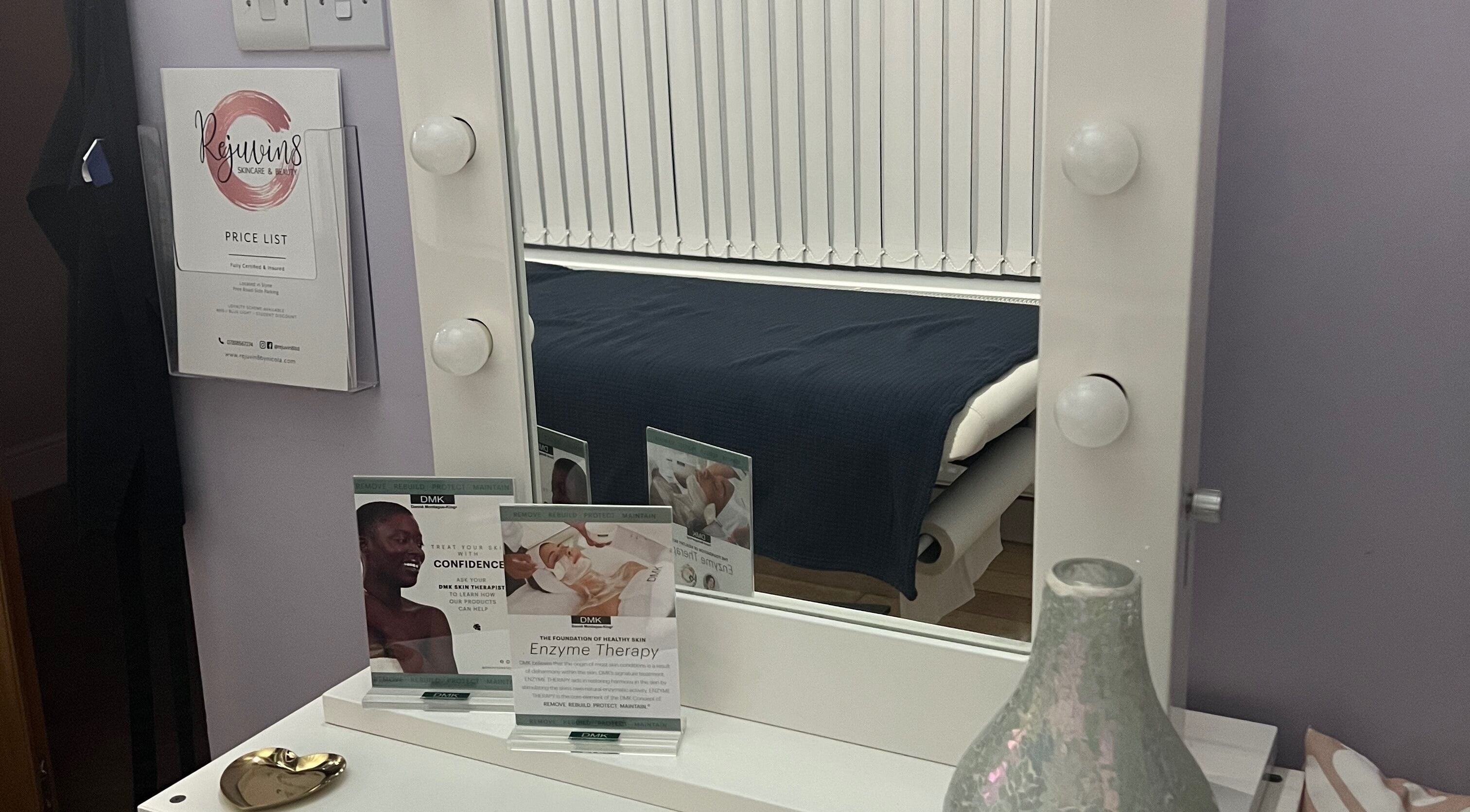Rejuvin8 beauty station with mirror, price list, and therapy brochures in Slyne, England, GB.