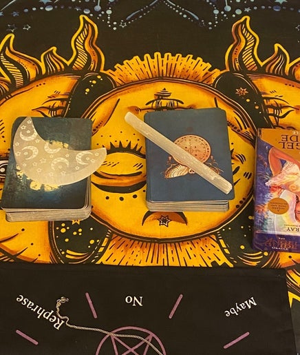 Tarot cards on sun design cloth at Teresa intuitive readings, Port Coquitlam, British Columbia, CA.