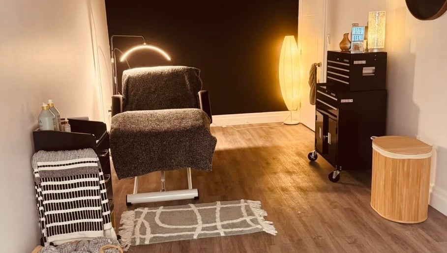 Relaxing ambience in The Sugar Lounge, St. Thomas, Ontario, CA showcasing a serene treatment room.