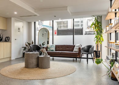 Inviting lounge at BKT BEAUTY, Sydney, NSW, AU with modern decor and vibrant plants.