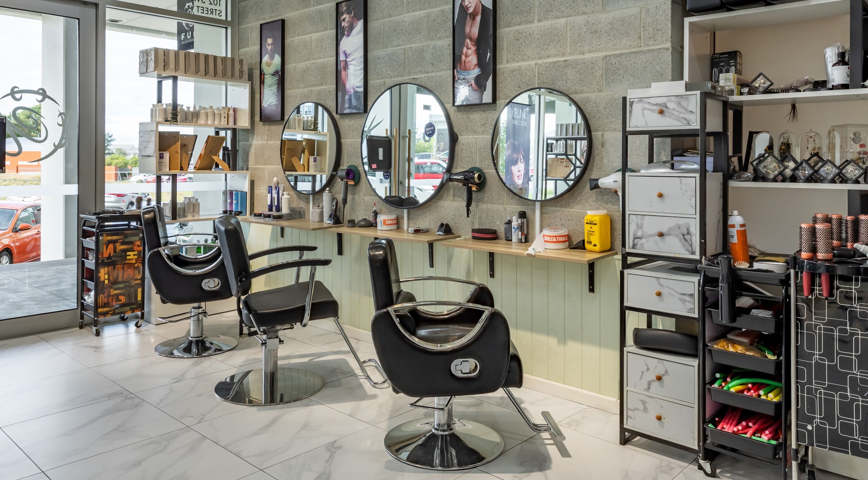 Modern salon at Fun Hair & Beauty, Gungahlin, ACT, AU with stylish seating and hair products on display.