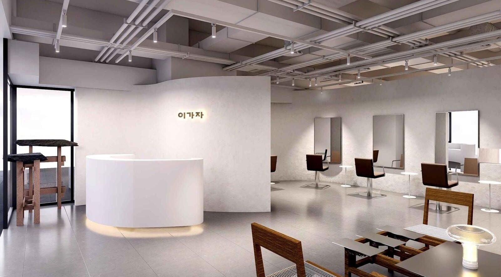 Sophisticated interior of LEEKAJA Tangs Plaza, Singapore, featuring modern beauty stations and a sleek reception.