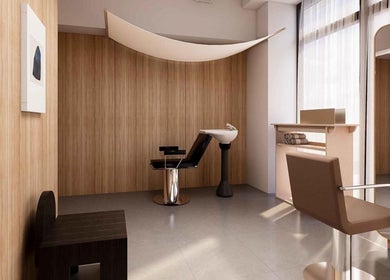 Elegant salon interior at LEEKAJA Tangs Plaza, Singapore, SG featuring a stylish chair and sleek design.