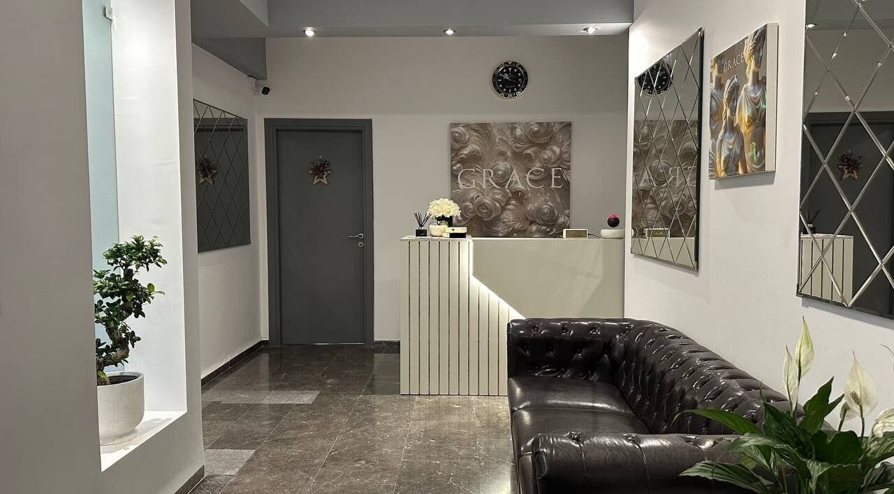 Sophisticated entrance of GRACE body&face, Glyfada, GR with a chic reception and comfy seating.