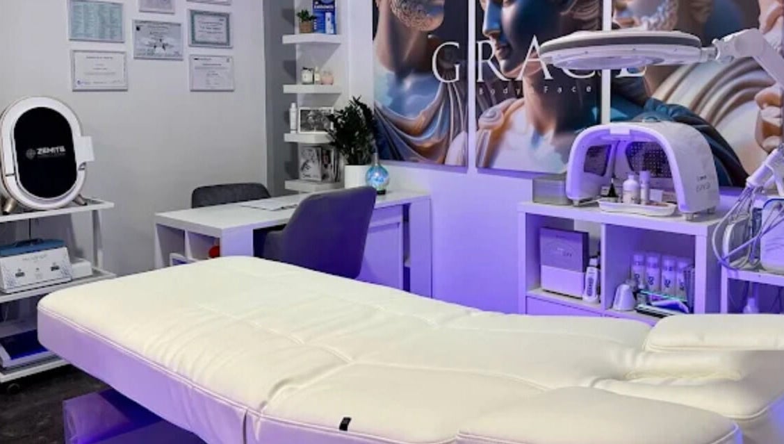 Modern treatment room at GRACE body&face in Glyfada, GR, featuring advanced skincare equipment.
