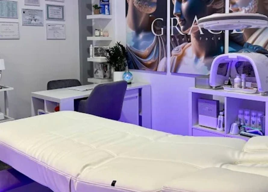 Modern treatment room at GRACE body&face in Glyfada, GR, featuring advanced skincare equipment.