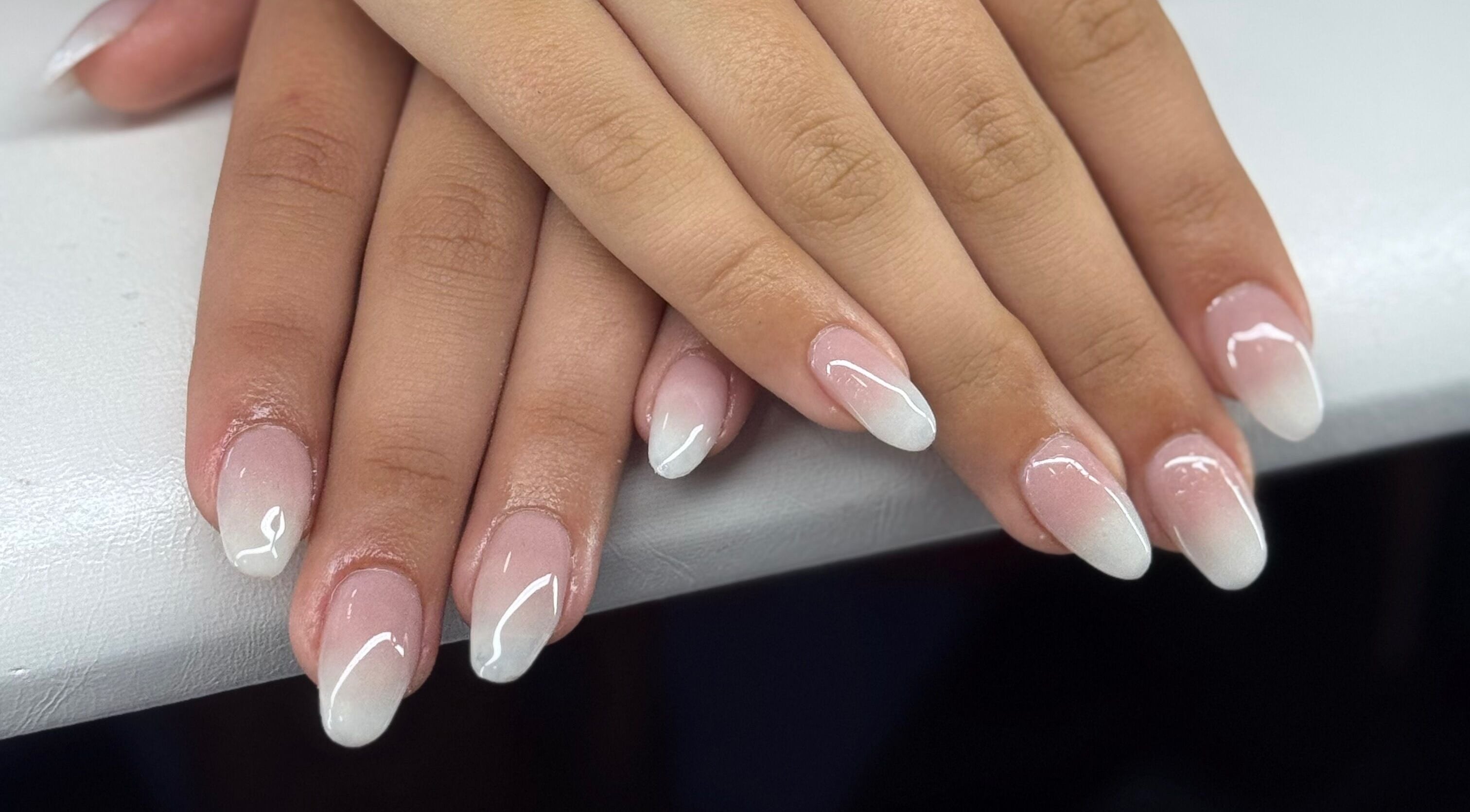 Elegant French manicure at The Girls Club Beauty Studio, George, Western Cape, ZA showcasing perfect nail art.