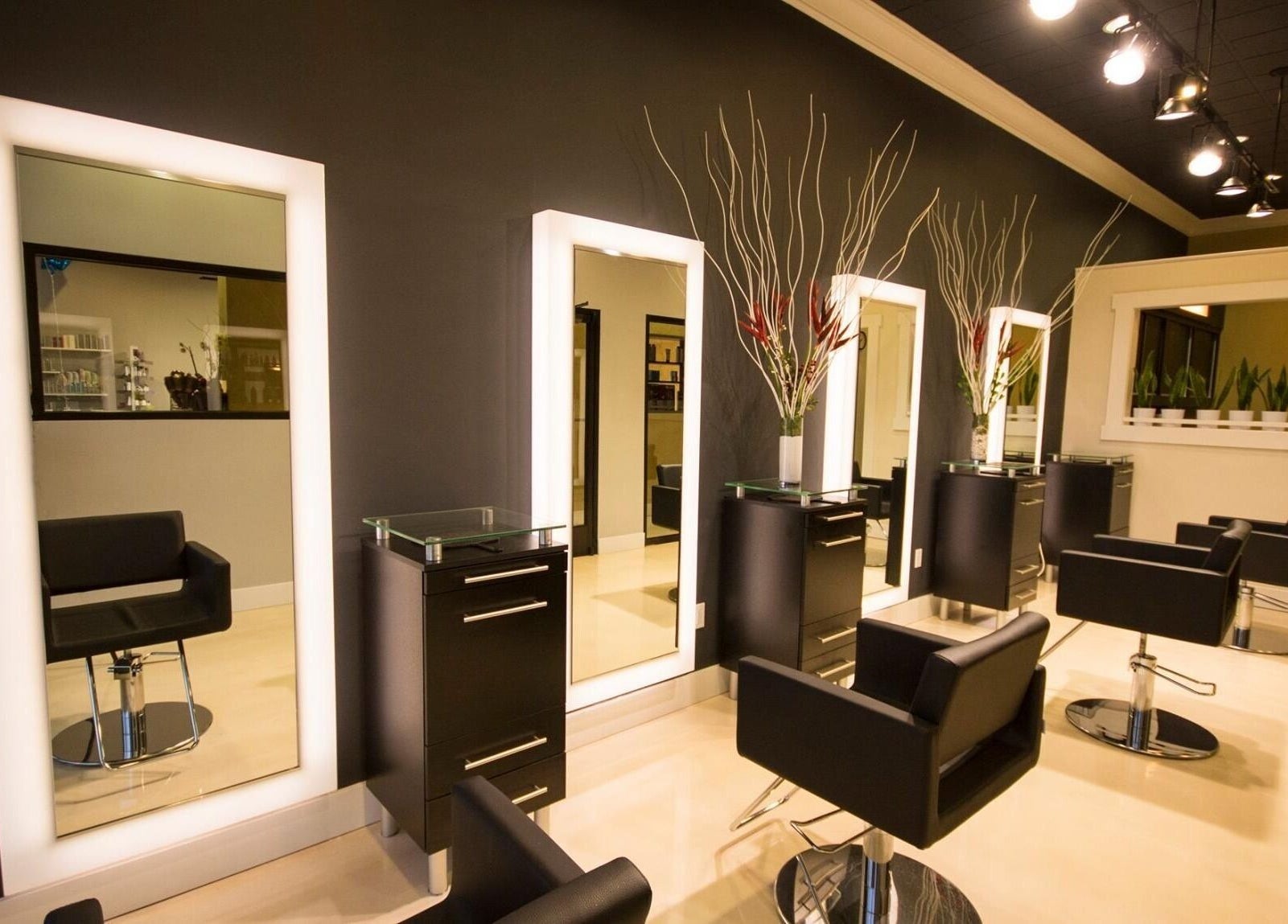 Chic salon interior at Lyna's Beauty Salon in Menlo Park, California, US, showcasing modern chairs and mirrors.