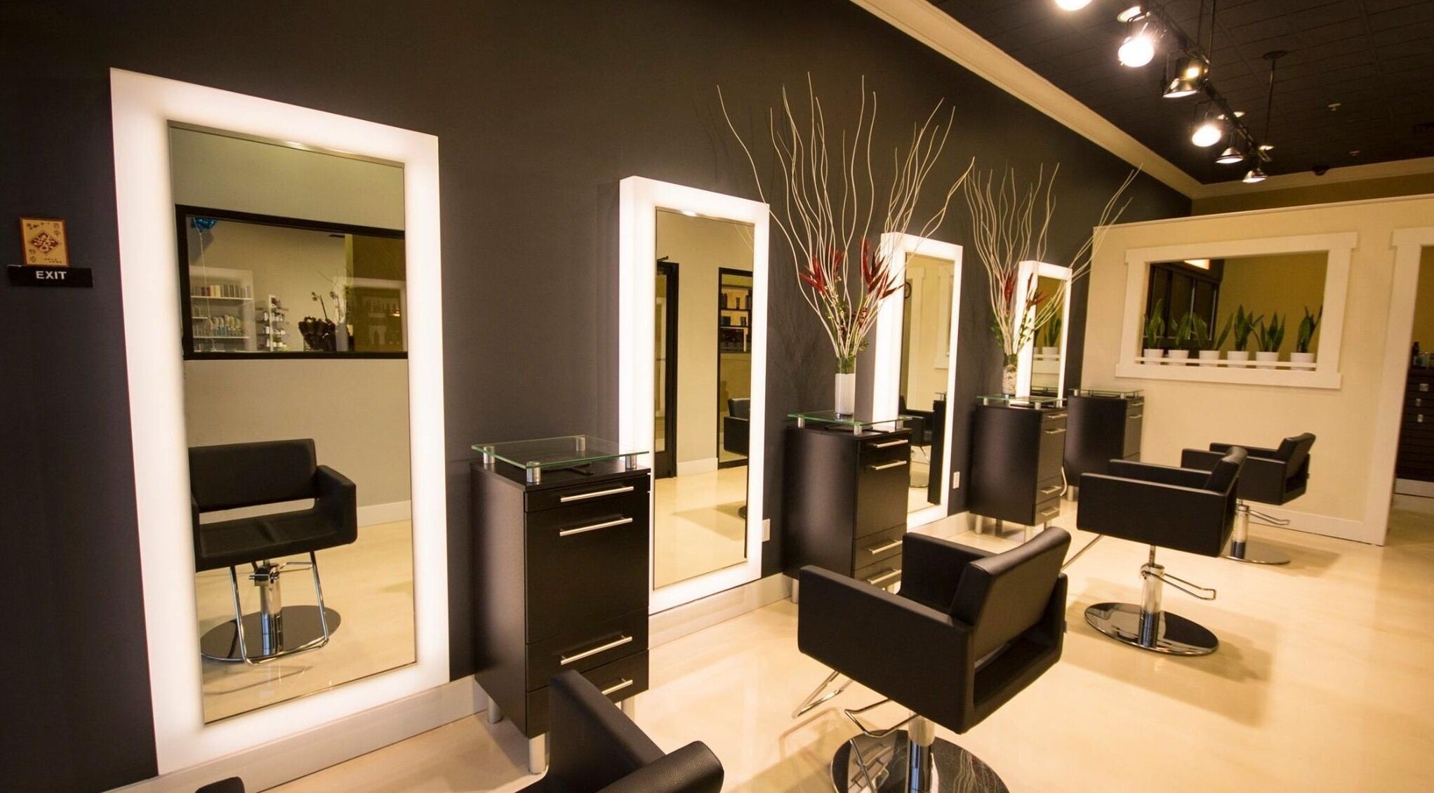 Chic salon interior at Lyna's Beauty Salon in Menlo Park, California, US, showcasing modern chairs and mirrors.