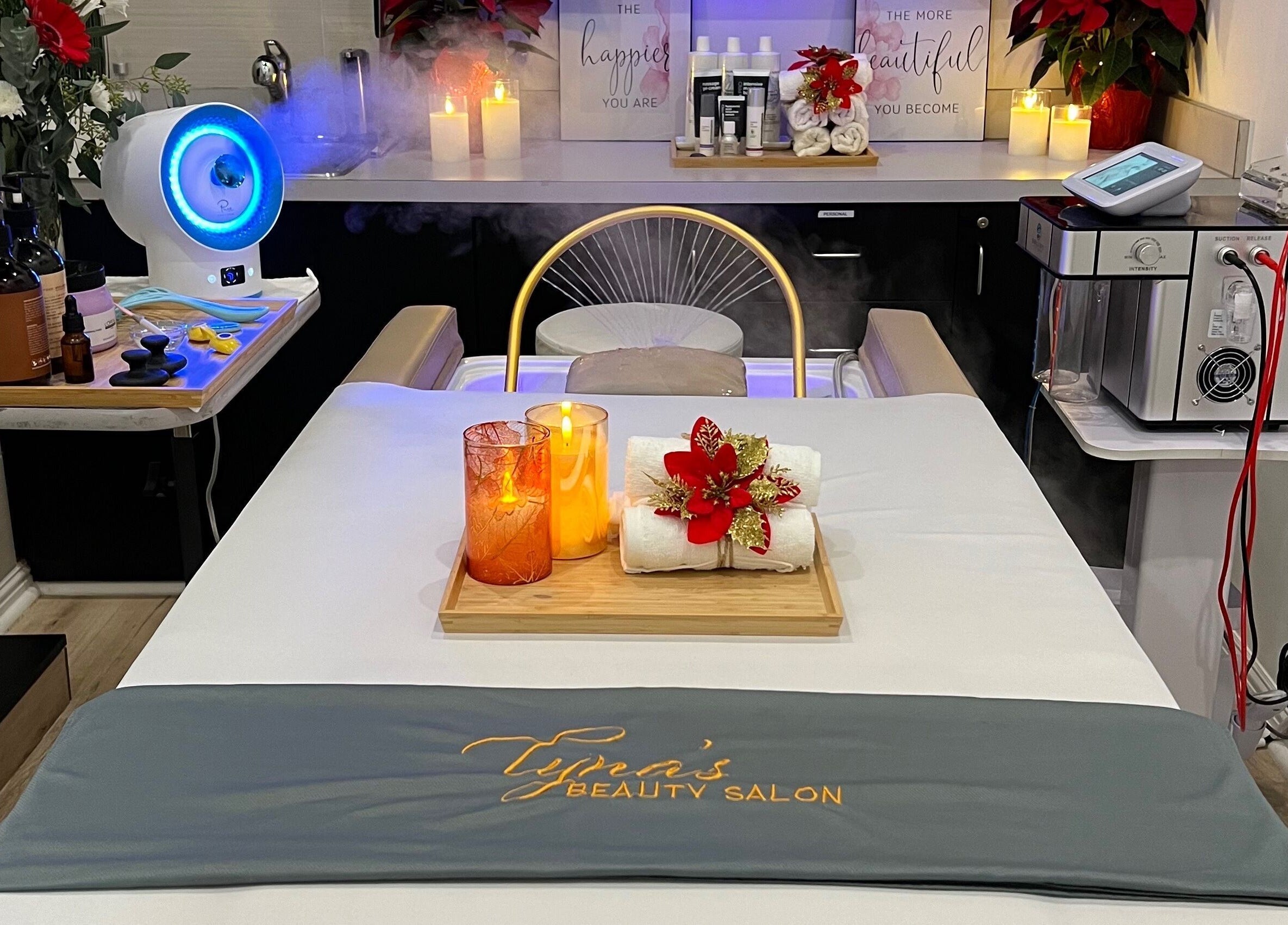 Luxurious spa setup at Lyna's Beauty Salon, Menlo Park, California, US, featuring candles and skincare tools.