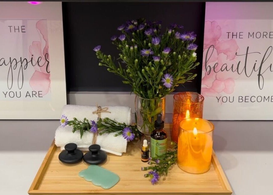 Tranquil spa decor at Lyna's Beauty Salon in Menlo Park, California, US with flowers and candles.