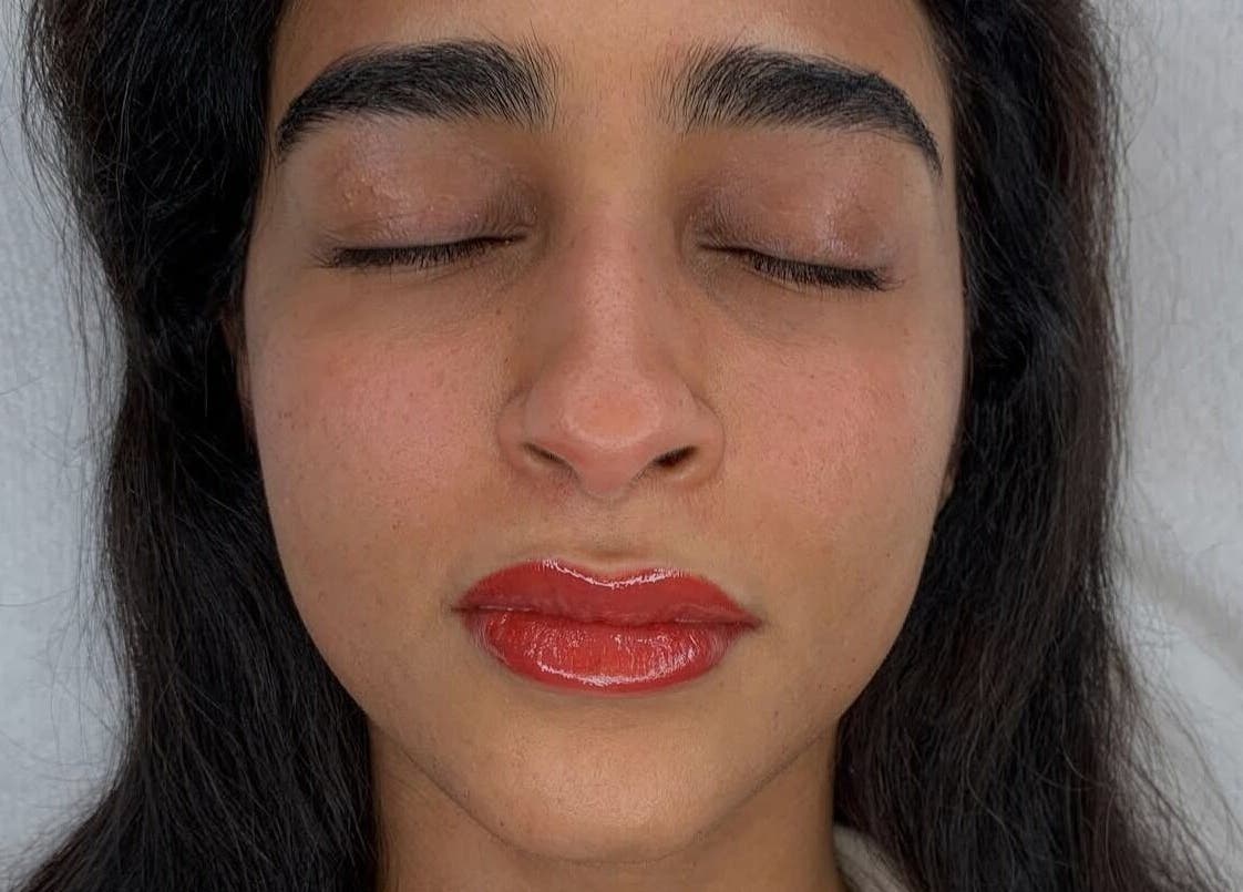 Close-up of lips with fresh tint at Natural Pmu, London, England, GB.