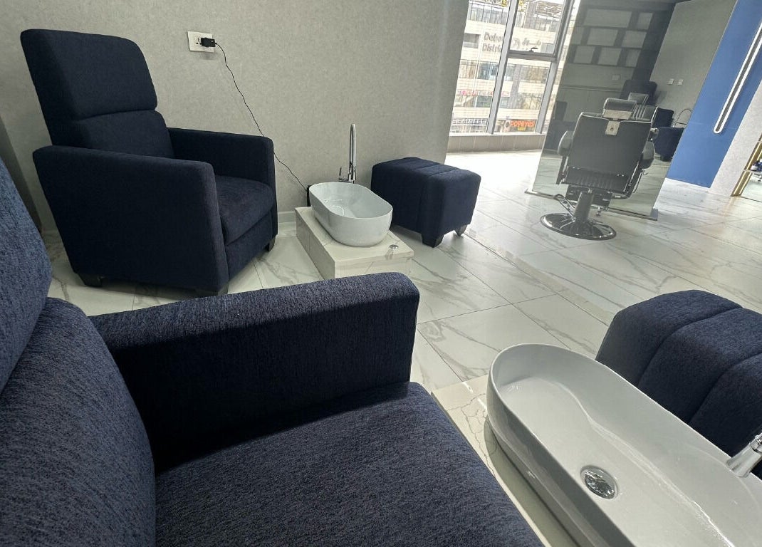 Elegant spa interiors at Convo, Amman, Amman Governorate, JO, featuring plush seating and modern design.