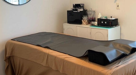 Relaxing treatment room at Aesthetics by Juhliah J M in Bend, Oregon, US, featuring a massage table.