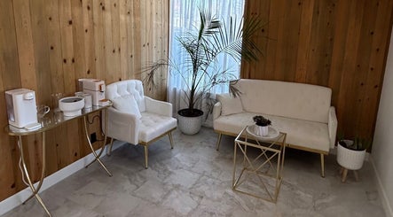 Cozy seating area at Aesthetics by Juhliah J M, featuring modern decor in Bend, Oregon, US.