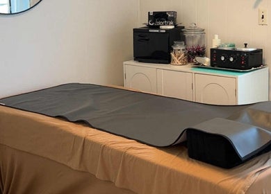 Treatment bed at Aesthetics by Juhliah J M, Bend, Oregon, US, ready for a relaxing session.