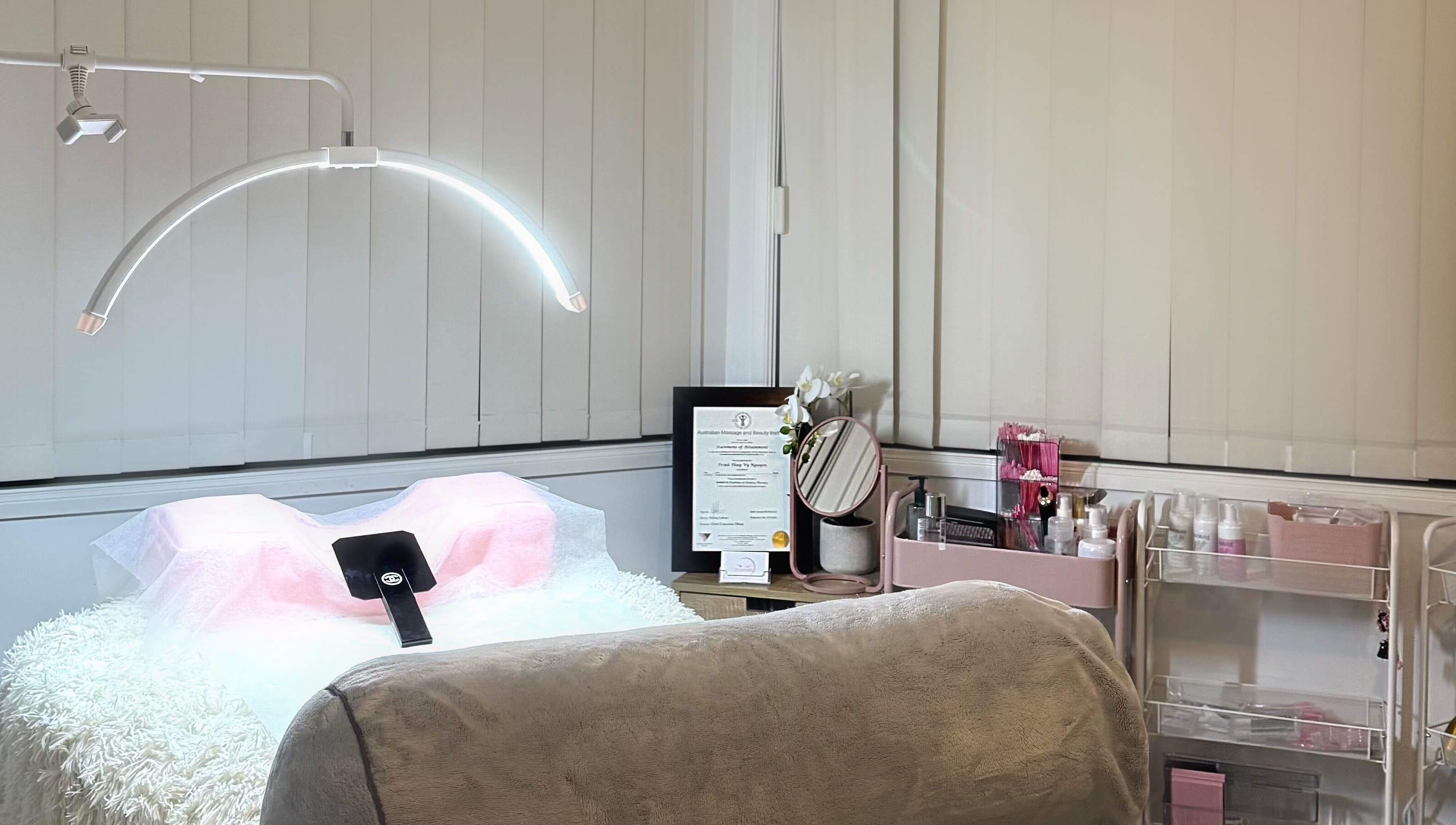 Cozy beauty treatment room at V's Lashes, Hamlyn Terrace, New South Wales, AU, with serene decor and professional setup.