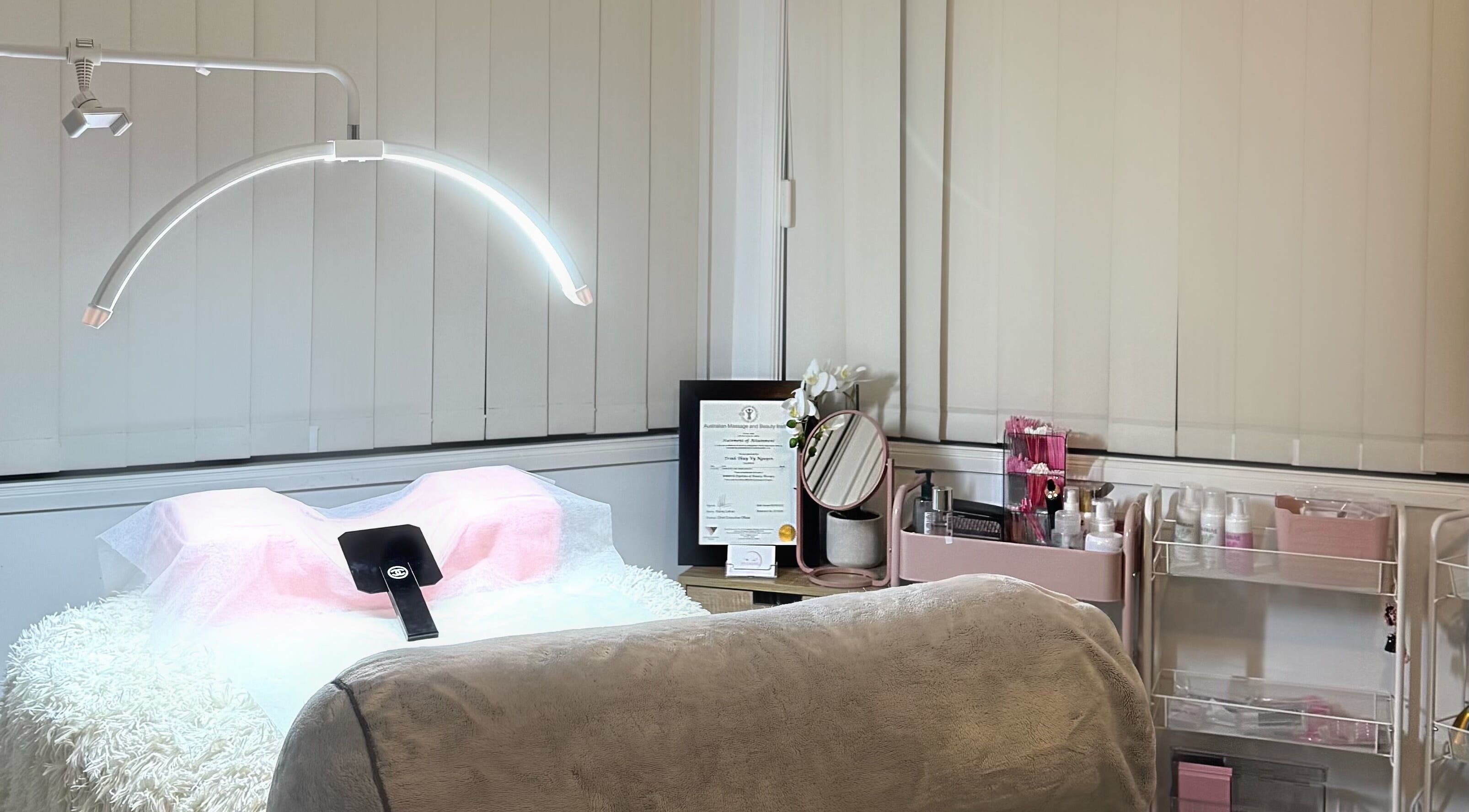 Cozy beauty treatment room at V's Lashes, Hamlyn Terrace, New South Wales, AU, with serene decor and professional setup.