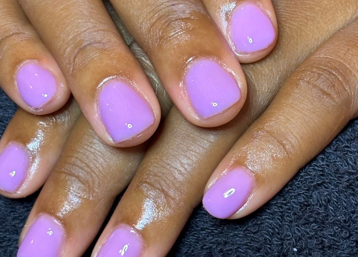 Lavender nail polish manicure at STUDIO 10, FREEPORT, Grand Bahama, BS, showcasing elegant nail care.