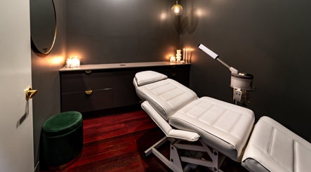Calm treatment room at Breathe Beauty, Wembley, Western Australia, AU, with soft lighting and comfy chair.