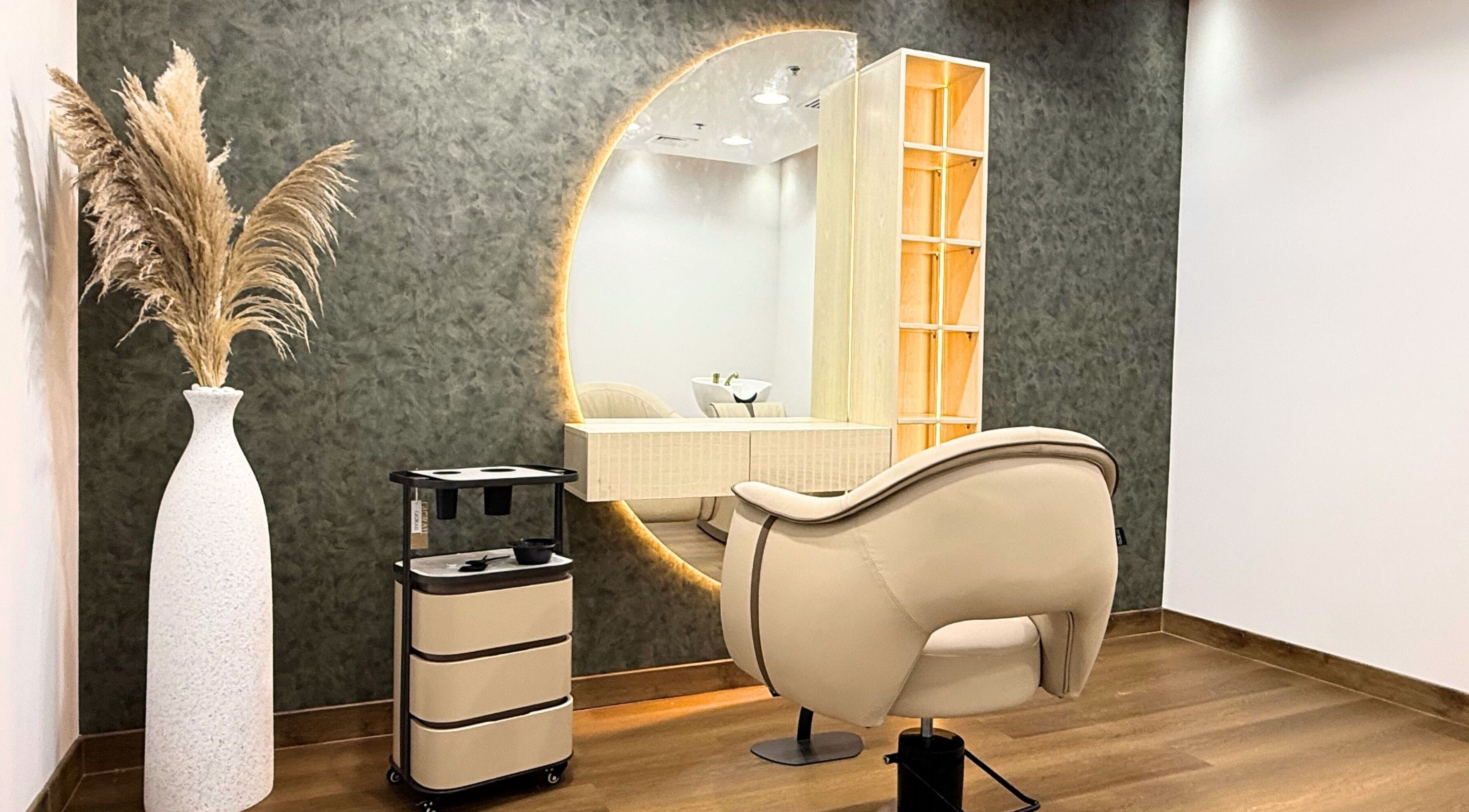 Luxurious styling chair and decor at Luca Piattelli Hair Fixing Center, Dubai, Dubai, AE.