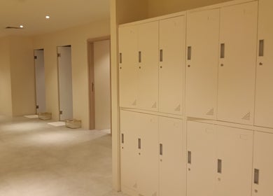 Spacious locker room at Haru Fit Tokyo, Jakarta Selatan, DKI Jakarta, ID, offering modern amenities.