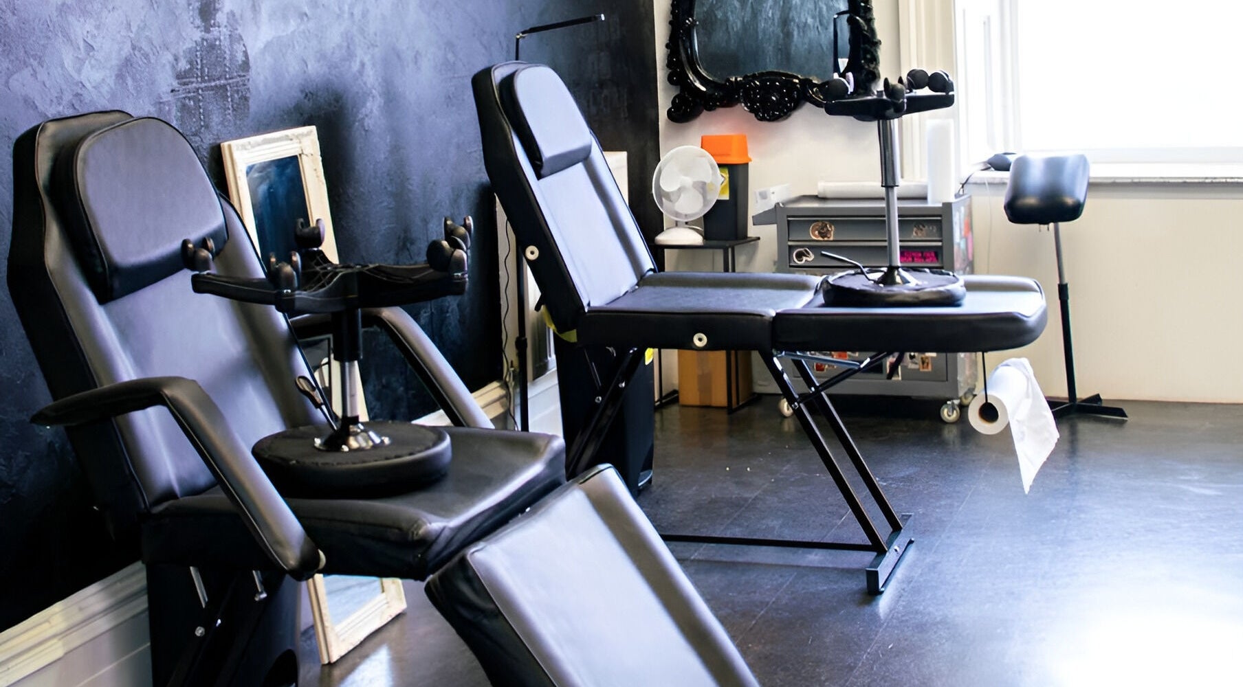 Nu metal beauty studio in Brechin, Scotland, GB featuring modern treatment chairs in a serene setting.