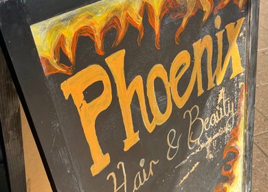 Colorful 'Phoenix Hair & Beauty' signboard outside Cherry Lashes|Brows by Anna Dunlop in Ayr, Scotland, GB.