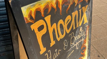 Colorful 'Phoenix Hair & Beauty' signboard outside Cherry Lashes|Brows by Anna Dunlop in Ayr, Scotland, GB.