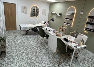 Elegant CBbeauty salon room with nail stations and decor in Bedwas, Wales, GB.
