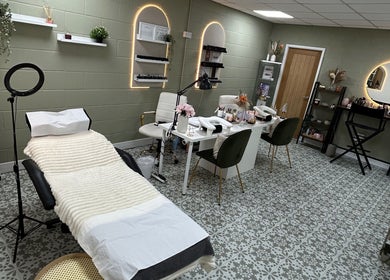 Elegant beauty treatment room at CBbeauty, Bedwas, Wales, GB, featuring comfortable chairs and serene decor.