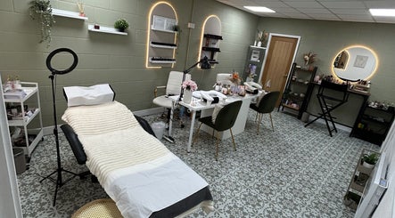 Elegant beauty treatment room at CBbeauty, Bedwas, Wales, GB, featuring comfortable chairs and serene decor.